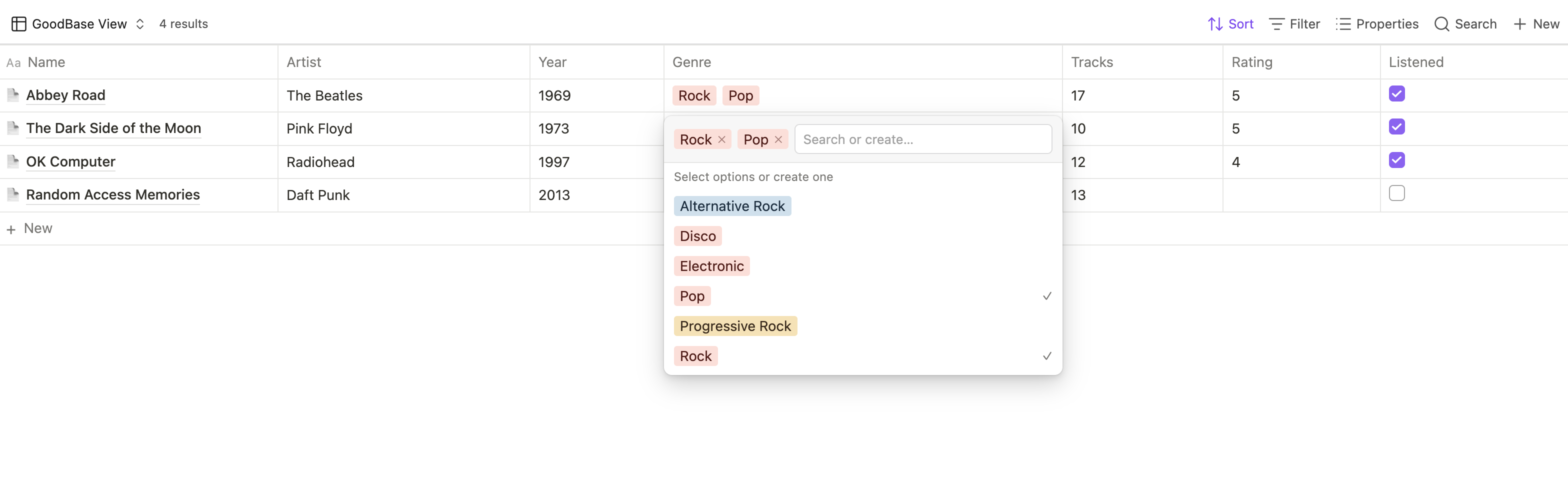 The pill select editor: current values as removable pills, a search-or-create input, and every known value for the property